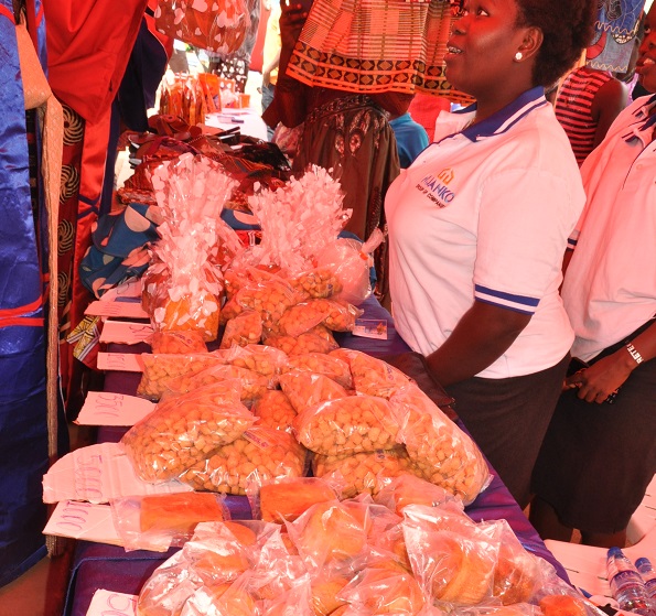 Students displaying bakery products.